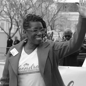 Politician waving to the public 